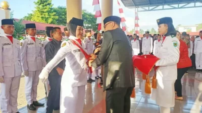 Pj Bupati Limi Mokodompit Kukuhkan 36 Anggota Paskibraka di Bolmong, Selasa 15 Agustus 2023.