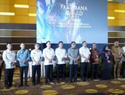 Pj Bupati Bolmong dr Jusnan Hadiri Penganugerahan Paritrana Awards